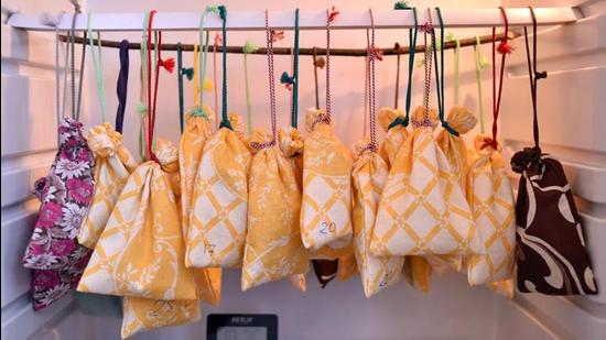 Cloth bags with the bats inside hang in a fridge prior to their awakening after winter hibernating at a bat rescue centre in Minsk on March 23, 2019. (Photo by Sergei GAPON / AFP) (AFP/REPRESENTATIVE PHOTO)