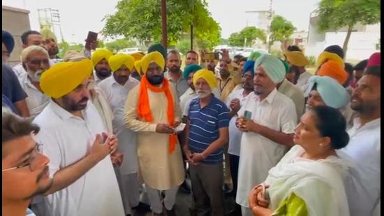 Punjab AAP president Bhagwant Mann meeting party workers in Sangrur on Thursday.