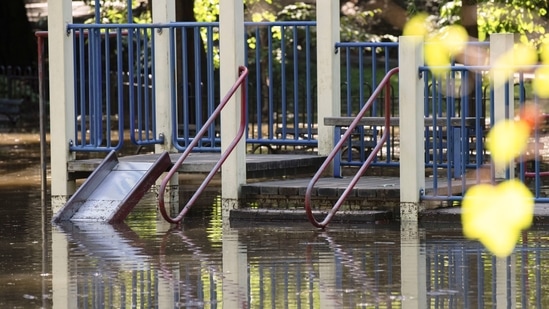 A slide is pictured at a flooded playground after the remnants of Tropical Storm Ida brought drenching rain and the threat of flash floods and tornadoes to parts of the northern mid-Atlantic, in the Brooklyn borough of New York City, U.S., September 2, 2021. REUTERS/Caitlin Ochs(REUTERS)