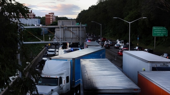Trucks are seen abandoned on the Major Deegan Expressway. Hundreds of flights were cancelled at LaGuardia and JFK airports, as well as at Newark, where video showed a terminal inundated by rainwater.(REUTERS)