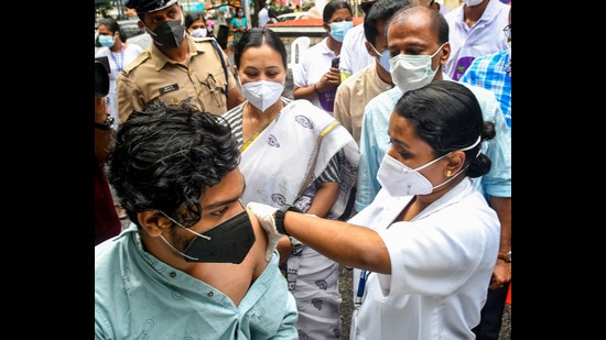 A medic administers a dose of Covid-19 vaccine to a beneficiary in Thiruvananthapuram on August 19, 2021. (PTI)