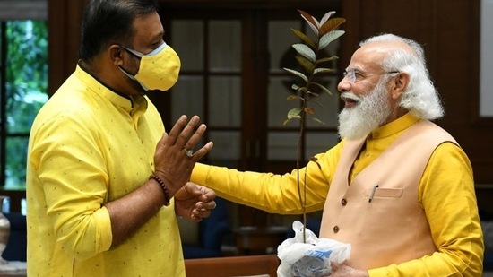 Jayalakshmi handed over the sapling to gift to PM Modi during Gopi's visit to Gandhi Bhavan in Pathanapuram earlier this week. (Suresh Gopi/Twitter)