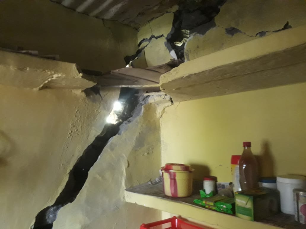 Cracks have developed in walls of some of the houses in Sainrathi village. (HT photo)