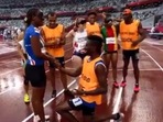 The image shows visually impaired sprinter Keula Nidreia Pereira Semedo’s guide proposing to her.
