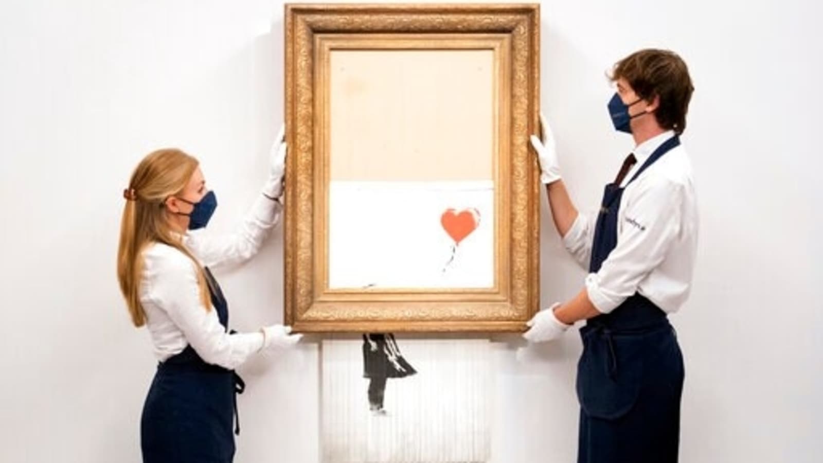 Banksy's half-shredded artwork 'Love is in the Bin' could fetch over USD 5 million at auction