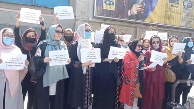 Women hold placards as they protest in Kabul, Afghanistan. (Reuters) Women hold placards as they protest in Kabul, Afghanistan. (Reuters)