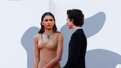 Timothee Chalamet and Zendaya pose for pictures at the festival. (REUTERS)
