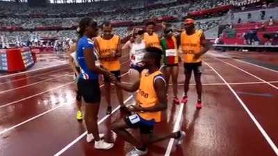The image shows visually impaired sprinter Keula Nidreia Pereira Semedo’s guide proposing to her. (Twitter/@Paralympics)