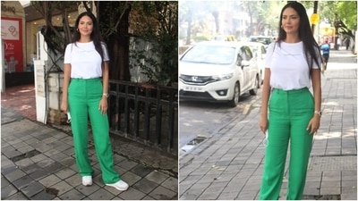 The pants worn by Esha for the outing came in a trendy parrot green colour. The high-waisted pants featured a straight fit and pockets on either side. (HT Photo/Varinder Chawla)