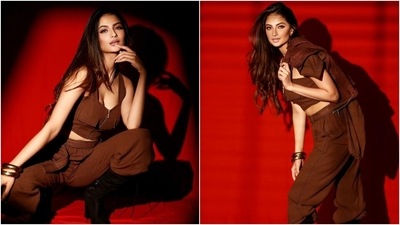 Palak teamed the top with a pair of high-waisted pants that came with a gathered hemline. The pants were cinched together with a matching belt and featured contrast stitching. (Instagram/@palaktiwarii)