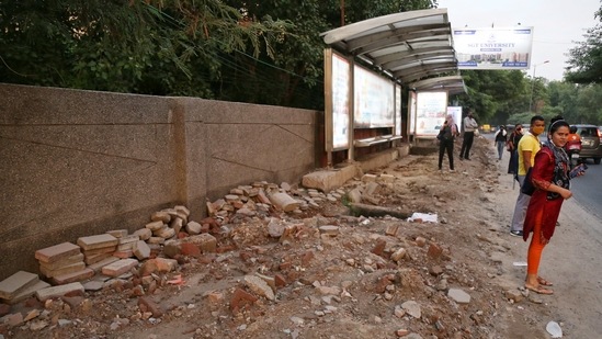 The construction debris is yet to be cleared from the road.(HT Photo) The construction debris is yet to be cleared from the road.(HT Photo)