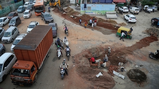 Traffic congestion at Ashram Chowk due to the construction work.(HT Photo) Traffic congestion at Ashram Chowk due to the construction work.(HT Photo)