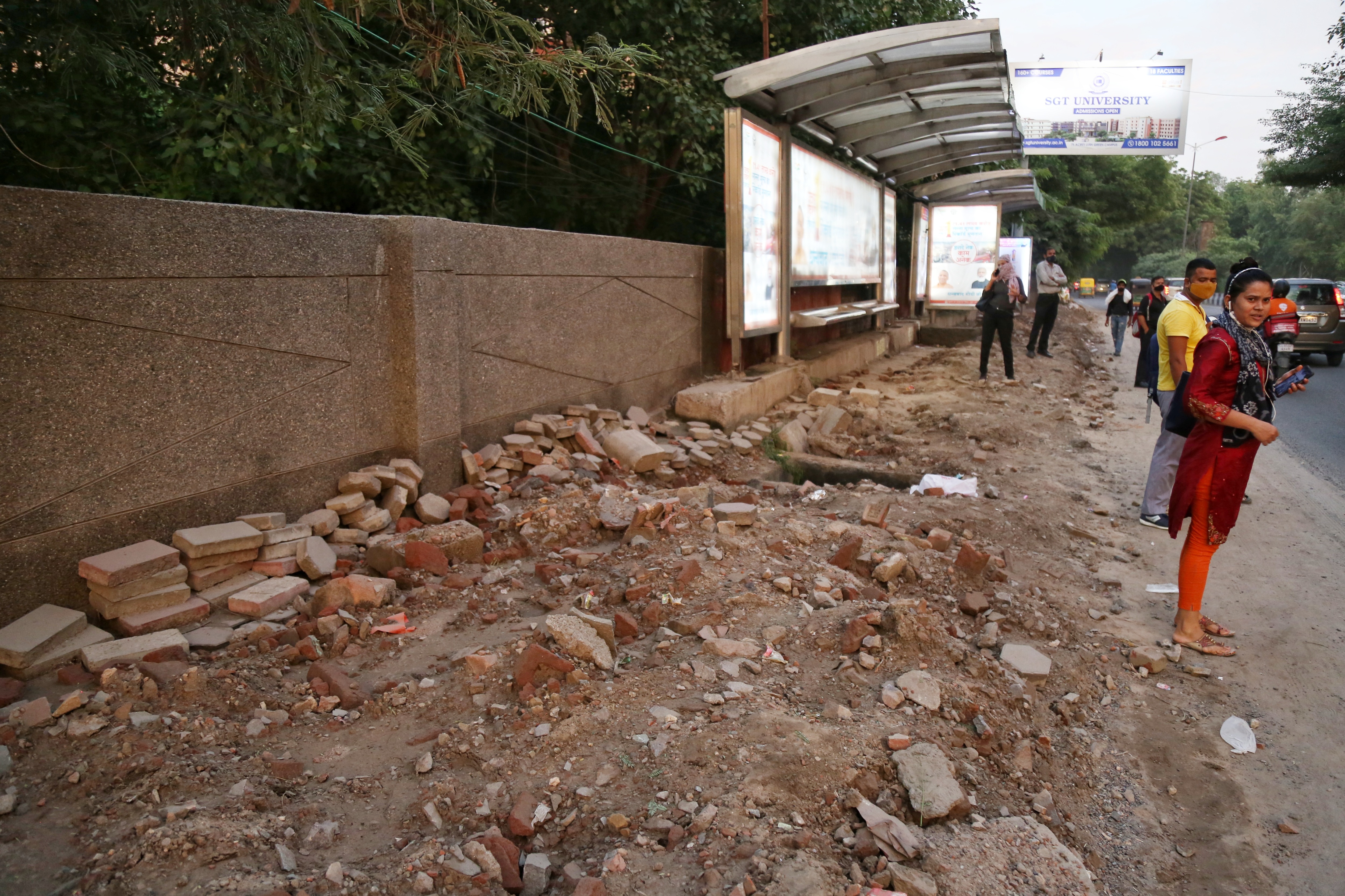 The construction debris is yet to be cleared from the road.(HT Photo) The construction debris is yet to be cleared from the road.(HT Photo)