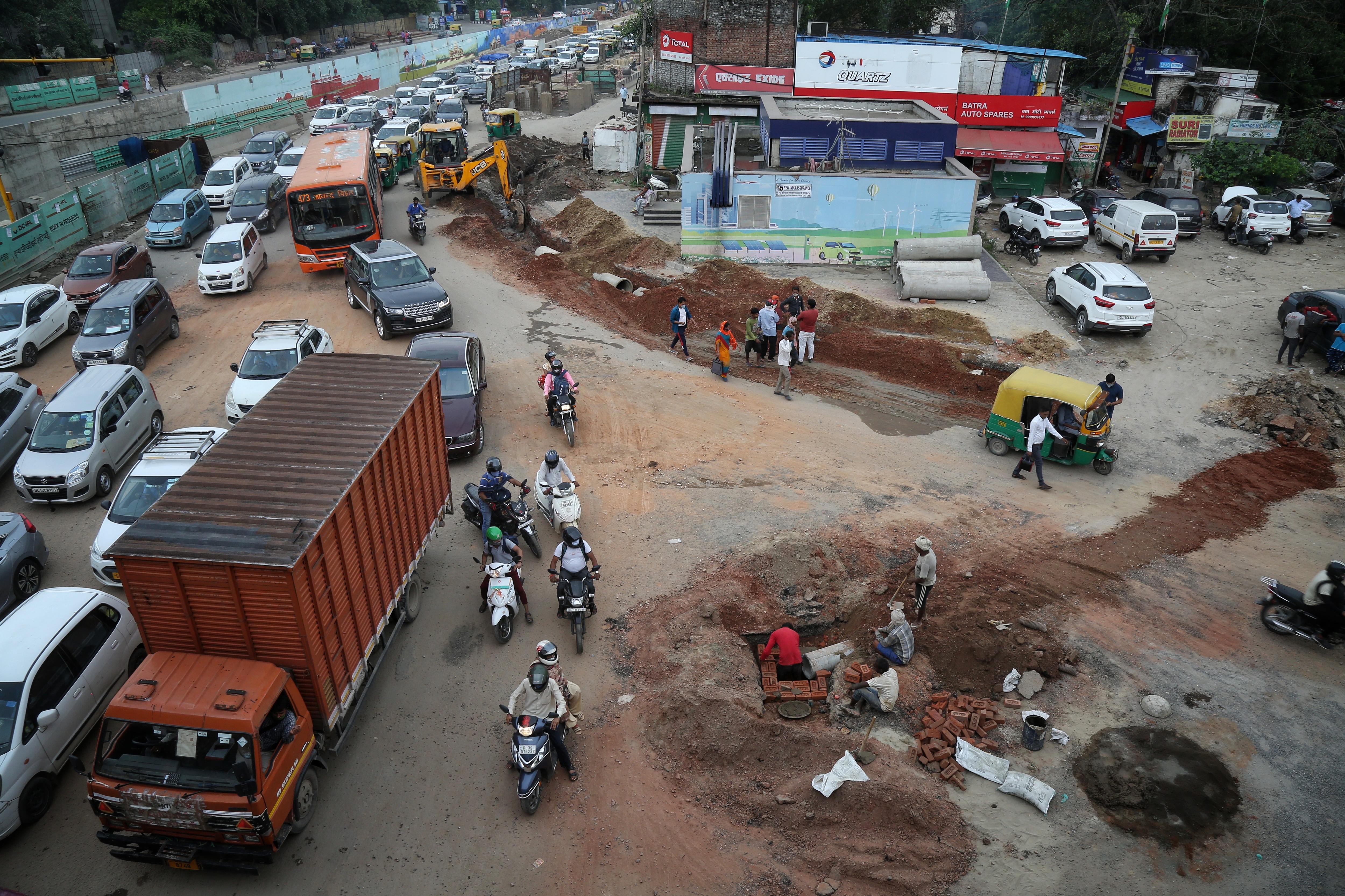 Traffic congestion at Ashram Chowk due to the construction work.(HT Photo) Traffic congestion at Ashram Chowk due to the construction work.(HT Photo)