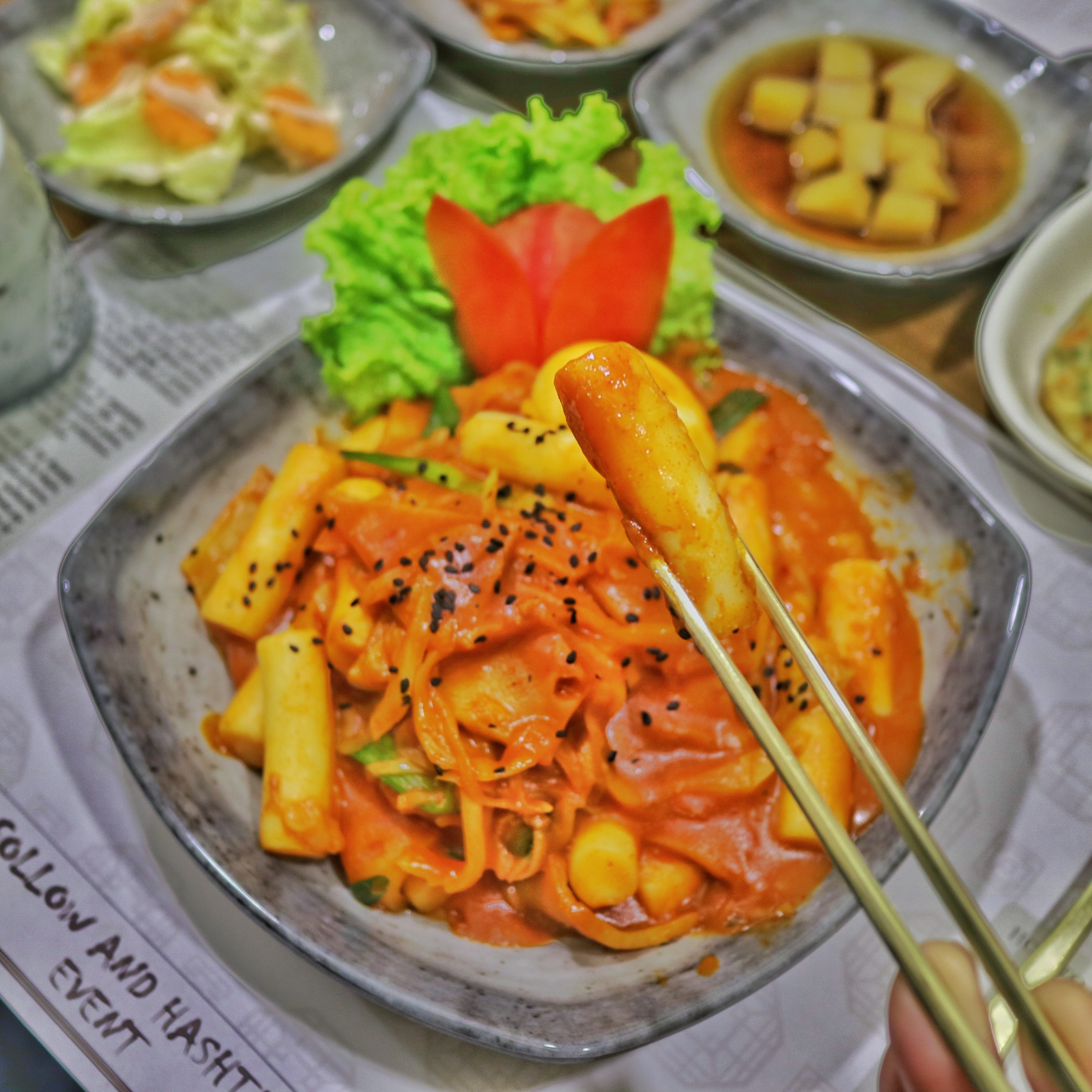 Tteokbokki served at Seoul Restaurant, Delhi. It is a popular Korean rice cake dish Tteokbokki served at Seoul Restaurant, Delhi. It is a popular Korean rice cake dish