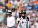 India's Shardul Thakur celebrates scoring his 50 runs on day four of the fourth Test match at The Oval cricket ground in London, Sunday, Sept. 5, 2021. (AP Photo/Kirsty Wigglesworth)(AP)
