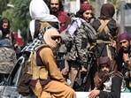 Taliban fighters patrol on vehicles along a street in Kabul. (AFP Photo) Taliban fighters patrol on vehicles along a street in Kabul. (AFP Photo)