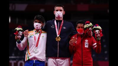 Silver medallist Suhas Lalinakere Yathiraj of India, gold medallist Lucas Mazur of France and bronze medallist Fredy Setiawan of Indonesia pose on the podium. (Reuters) Silver medallist Suhas Lalinakere Yathiraj of India, gold medallist Lucas Mazur of France and bronze medallist Fredy Setiawan of Indonesia pose on the podium. (Reuters)