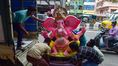 The move to allow public celebration of Ganesh Chathurthi comes at a time when Karnataka’s new Covid-19 infections appear to have stabilized but the threat of the virus remains just as potent as the first two waves. (PTI) The move to allow public celebration of Ganesh Chathurthi comes at a time when Karnataka’s new Covid-19 infections appear to have stabilized but the threat of the virus remains just as potent as the first two waves. (PTI)