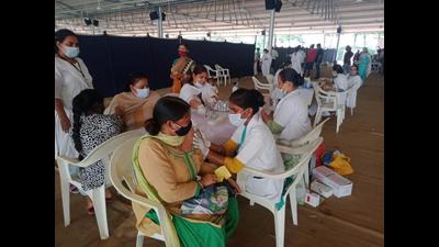 Health staff vaccinating residents at a camp in Subhash Nagar, Ludhiana, on Sunday. (HT Photo)