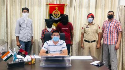 The accused in the custody of the anti-smuggling cell of Ludhiana police on Sunday. (HT PHOTO) The accused in the custody of the anti-smuggling cell of Ludhiana police on Sunday. (HT PHOTO)