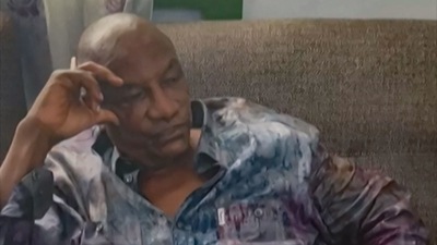 A screengrab taken from footage sent to AFP by a military source on September 5, 2021 shows the President of Guinea Conakry Alpha Conde after he was captured by army putschists during a coup d'etat in Conakry (AFP)