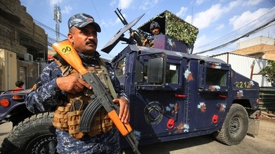 Thirteen policemen were killed in an attack by the Islamic State group against a checkpoint near Kirkuk in northern Iraq. In this file photo, the Iraqi federal police forces stand guard at a checkpoint in a street in the capital Baghdad. (AFP) Thirteen policemen were killed in an attack by the Islamic State group against a checkpoint near Kirkuk in northern Iraq. In this file photo, the Iraqi federal police forces stand guard at a checkpoint in a street in the capital Baghdad. (AFP)