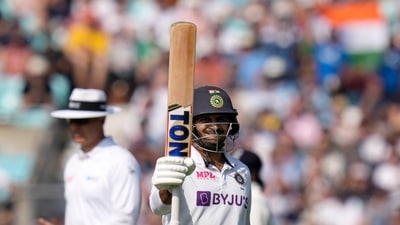 India's Shardul Thakur celebrates scoring his 50 runs on day four of the fourth Test match at The Oval cricket ground in London, Sunday, Sept. 5, 2021. (AP Photo/Kirsty Wigglesworth) (AP) India's Shardul Thakur celebrates scoring his 50 runs on day four of the fourth Test match at The Oval cricket ground in London, Sunday, Sept. 5, 2021. (AP Photo/Kirsty Wigglesworth) (AP)
