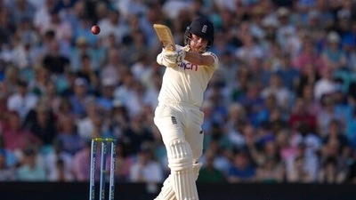 England's Rory Burns plays a shot off the bowling of India's Umesh Yadav on day four of the fourth Test match at The Oval cricket ground in London, Sunday, Sept. 5, 2021. (AP Photo/Kirsty Wigglesworth) (AP) England's Rory Burns plays a shot off the bowling of India's Umesh Yadav on day four of the fourth Test match at The Oval cricket ground in London, Sunday, Sept. 5, 2021. (AP Photo/Kirsty Wigglesworth) (AP)