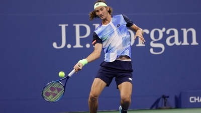 Lloyd Harris of South Africa hits a forehand against Denis Shapovalov of Canada on day six of the 2021 US Open (USA TODAY Sports)