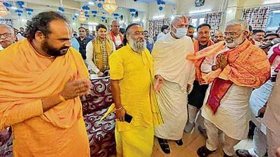 UP BJP chief Swantantra Dev Singh with saints in Ayodhya at the launch of the party’s intellectual meet. (SOURCED)