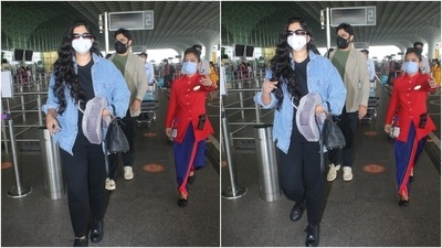 Airport looks are supposed to be comfy and effortless. However, very few celebrities manage to mix chic fits to this style. Rhea and Karan did the same, as they kept things informal for their jet-set look. (HT Photo/Varinder Chawla)