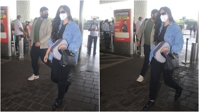 Giving us couple fashion goals, Rhea and Karan arrived at the airport wearing casual and comfortable outfits. Rhea opted for an all-black look featuring a crewneck top and matching jogger set. (HT Photo/Varinder Chawla) Giving us couple fashion goals, Rhea and Karan arrived at the airport wearing casual and comfortable outfits. Rhea opted for an all-black look featuring a crewneck top and matching jogger set. (HT Photo/Varinder Chawla)