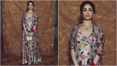 Yami teamed the bralette and skirt set with a sheer half-sleeved shrug featuring the same floral print. She accessorised her dreamy look with tan juttis, a pearl choker, layered gold necklaces, pink bangles, pearl earrings with chain tassels and a messy low ponytail. Minimal make-up, blush pink lip shade, and dewy skin rounded off her make-up. (Instagram/@yamigautam)