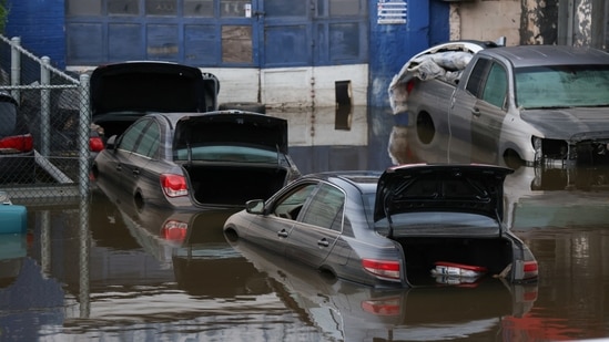 Cars sit in water after flooding on the Major Deegan Expressway spilled over into the neighboring street and flooded a parking lot, when the remnants of Tropical Storm Ida brought drenching rain and the threat of flash floods and tornadoes to parts of the northern mid-Atlantic, in the Bronx borough of New York City. (REUTERS)