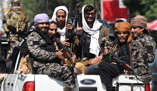 Taliban fighters patrol on vehicles (AFP/Representative Photo)