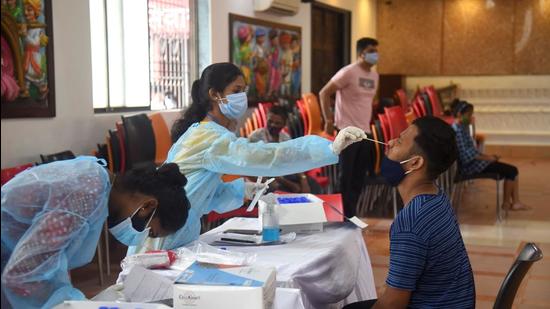 A citizen gets tested for Covid at a special test camp for people wanting to travel for Ganeshotsav, in Jogeshwari, Mumbai on Sunday. (Vijay Bate/HT)