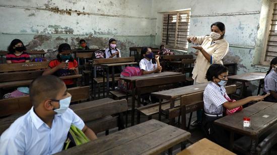 Maharashtra Mandal's Seth Dagaduram Katariya English Medium High School reopened at Mukundnagar in Pune on February 1, 2021, after ten months of lockdown by following the Covid protocol norms. (Rahul Raut/HT PHOTO)