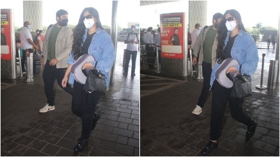 Giving us couple fashion goals, Rhea and Karan arrived at the airport wearing casual and comfortable outfits. Rhea opted for an all-black look featuring a crewneck top and matching jogger set.(HT Photo/Varinder Chawla)
