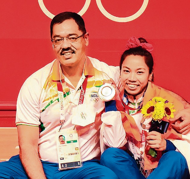 Silver medallist Mirabai Chanu says her coach, Vijay Sharma is like her father. (Photo: PTI) Silver medallist Mirabai Chanu says her coach, Vijay Sharma is like her father. (Photo: PTI)
