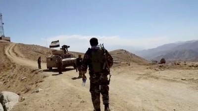 A humvee with National Resistance Front flag is seen in front of a radio mast near Panjshir Valley, Afghanistan in this still image obtained from an undated video handout.&nbsp; (REUTERS)
