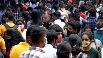 Locals gathered at the Sarojini Nagar Market, in New Delhi on Sunday. (ANI Photo)
