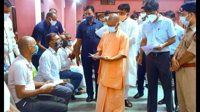 Uttar Pradesh Chief Minister Yogi Adityanath during ‘Janta Darshan’ programme in Gorakhpur, Sunday (PTI Photo)