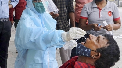 A health worker collects swab samples for Covid-19 tests in Nagpur, Maharashtra. (PTI)