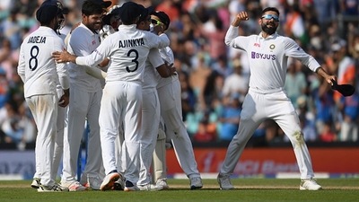 India celebrate the wicket of Chris Woakes in the last over before tea. (Getty) India celebrate the wicket of Chris Woakes in the last over before tea. (Getty)