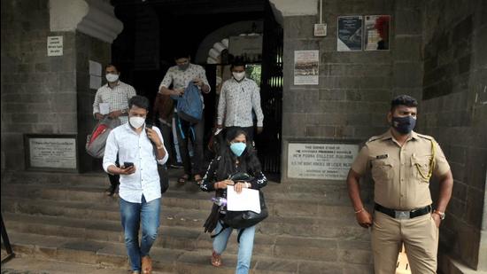 Students at SP College for competitive exam, on September 4. Director of Education, Pune, declared second merit list for FYJC online centralised admissions and college cutoffs. (HT)