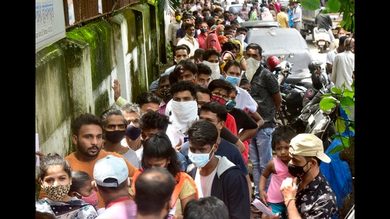 A vaccination queue in Kurla. Uddhav Thackeray also sought to justify Covid-19 restrictions in Maharashtra, saying that festivals can be celebrated later, but preventing another surge is important. (Anshuman Poyrekar/HT PHOTO)