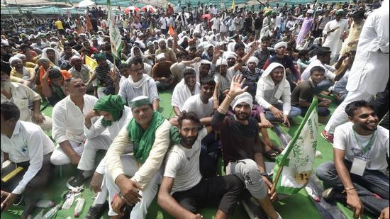 Farmers attend Kisan Mahapanchayat against Centre's farm reform laws in Muzaffarnagar, Uttar Pradesh, on Sunday, September 5. (PTI) Farmers attend Kisan Mahapanchayat against Centre's farm reform laws in Muzaffarnagar, Uttar Pradesh, on Sunday, September 5. (PTI)
