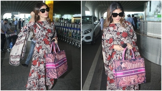 Today, Mouni was snapped by the paparazzi at the airport in a printed suit set. She made a case for floral prints in her effortlessly comfortable ensemble, and we are taking notes.(HT Photo/Varinder Chawla)
