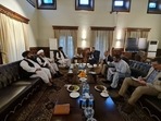Mullah Baradar, Head of the Taliban's Political Office, meets with members of the Red Cross in Kabul, Afghanistan.